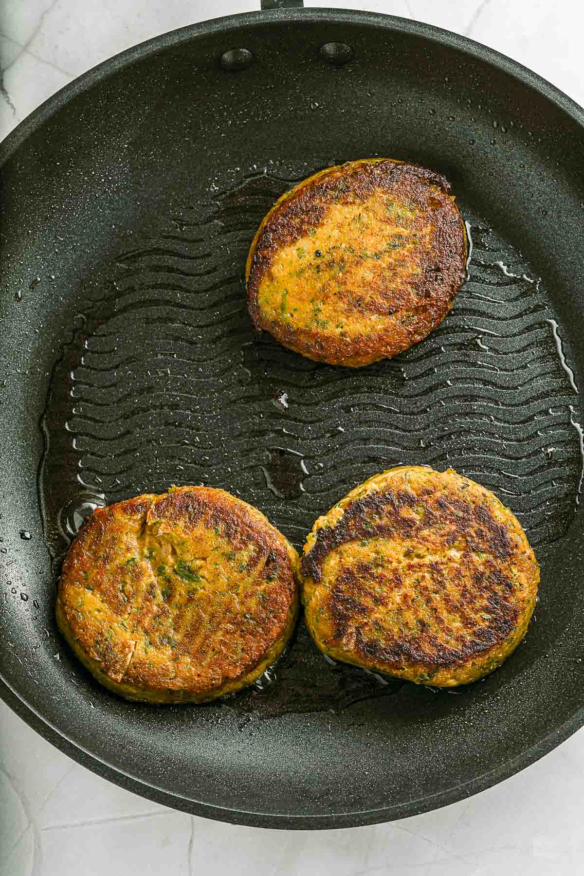 pan frying chickpea burgers