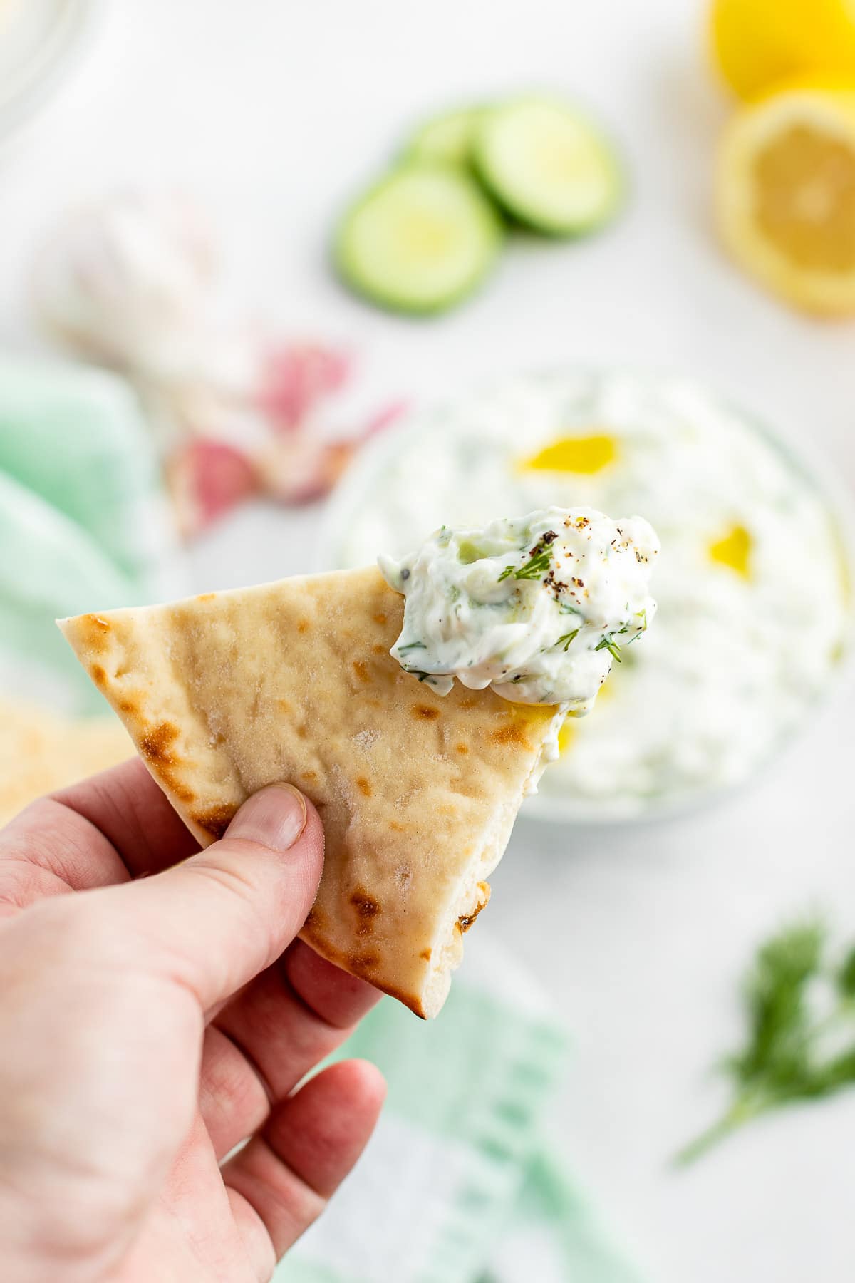 tzatziki sauce with pita triangle