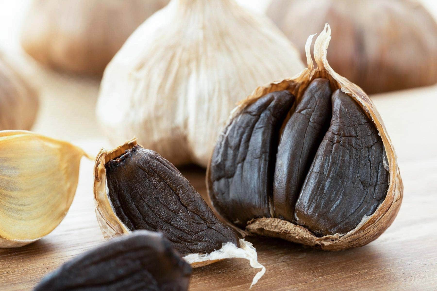 close up black garlic cloves 