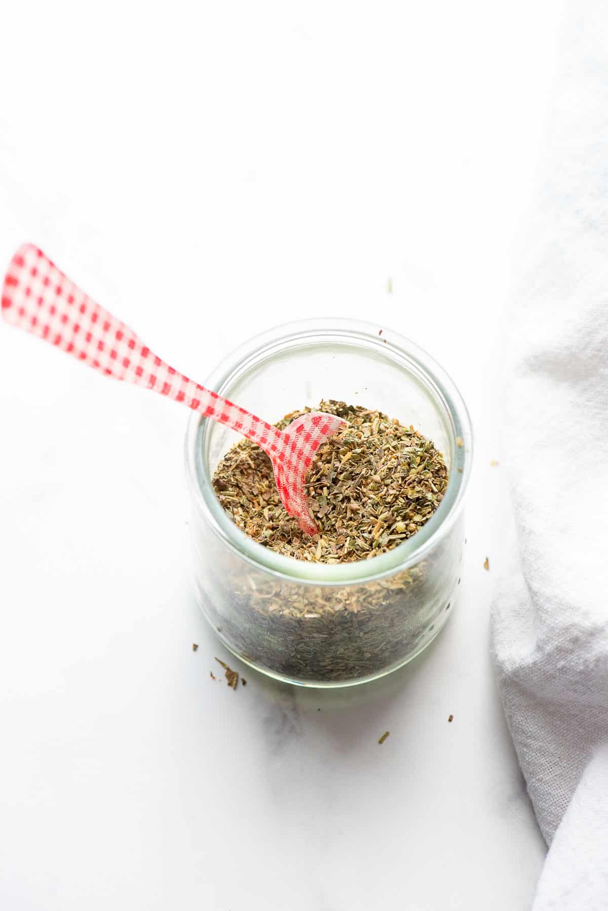 Italian seasoning in jar close up