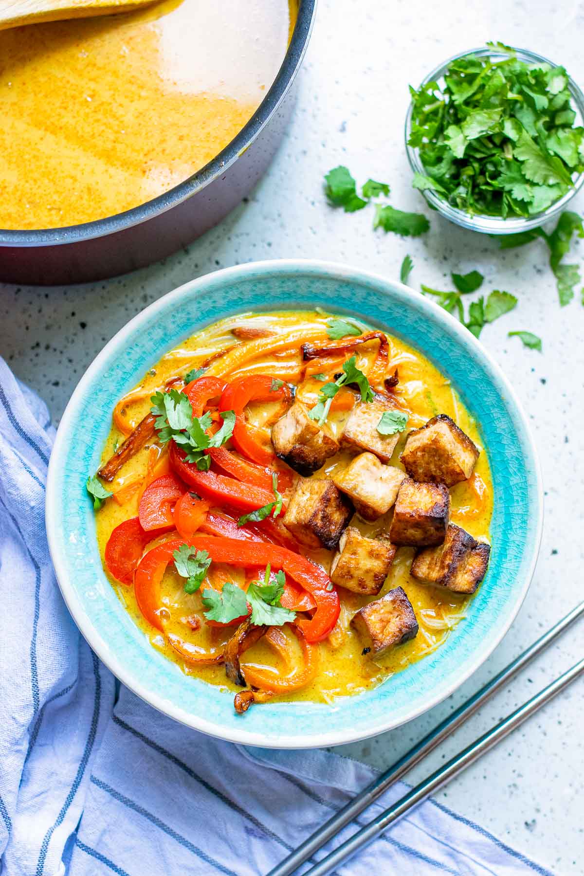 bowl of coconut curry soup with cilantro 