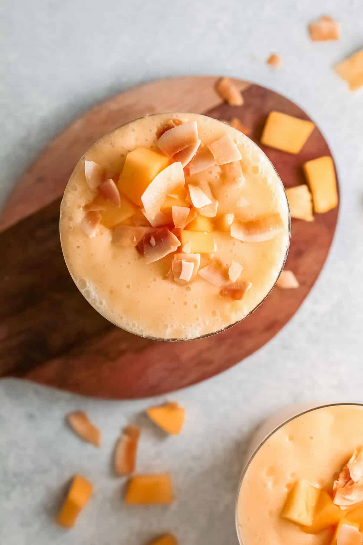 mango smoothie with toppings above