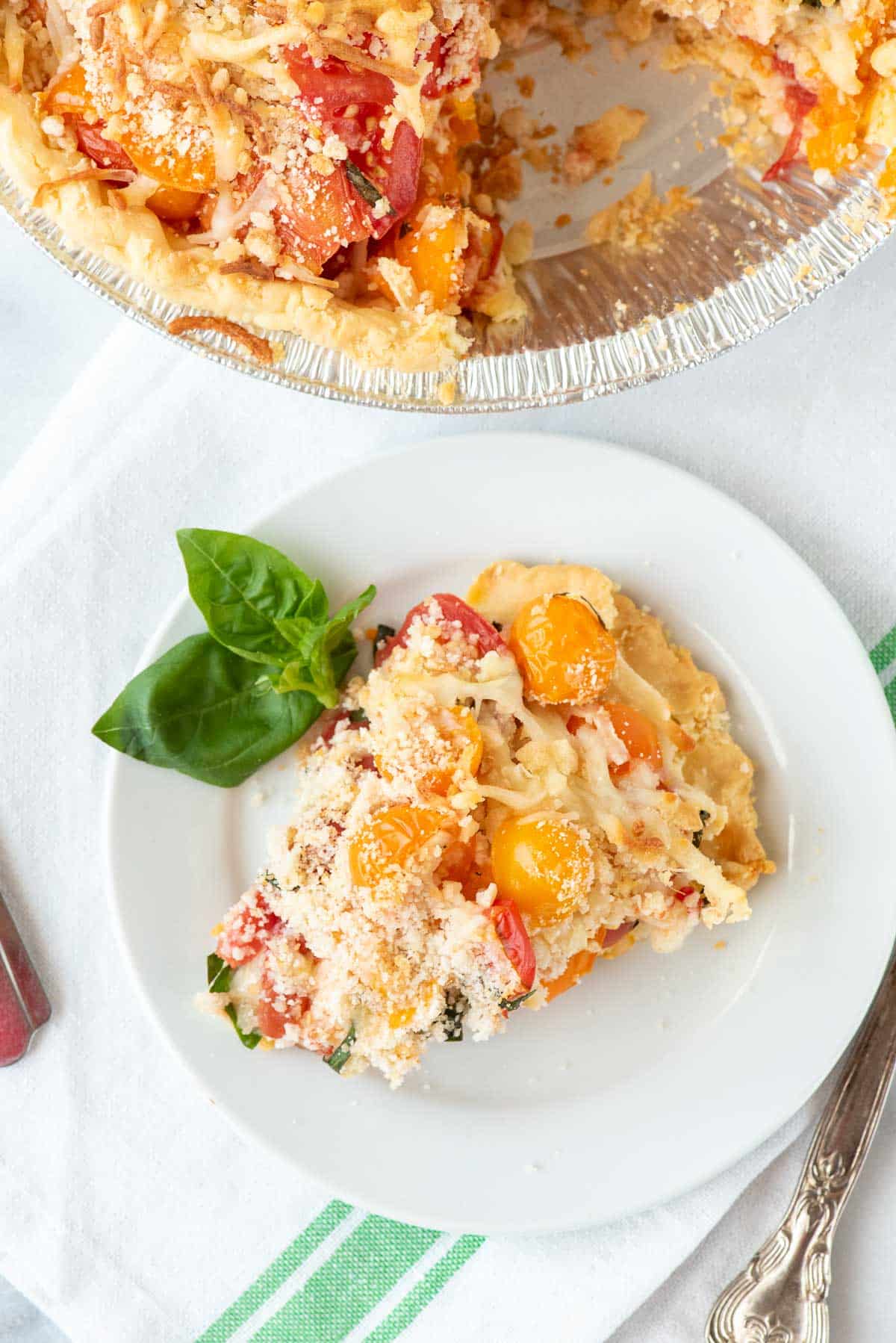 savory tomato pie slice overhead.