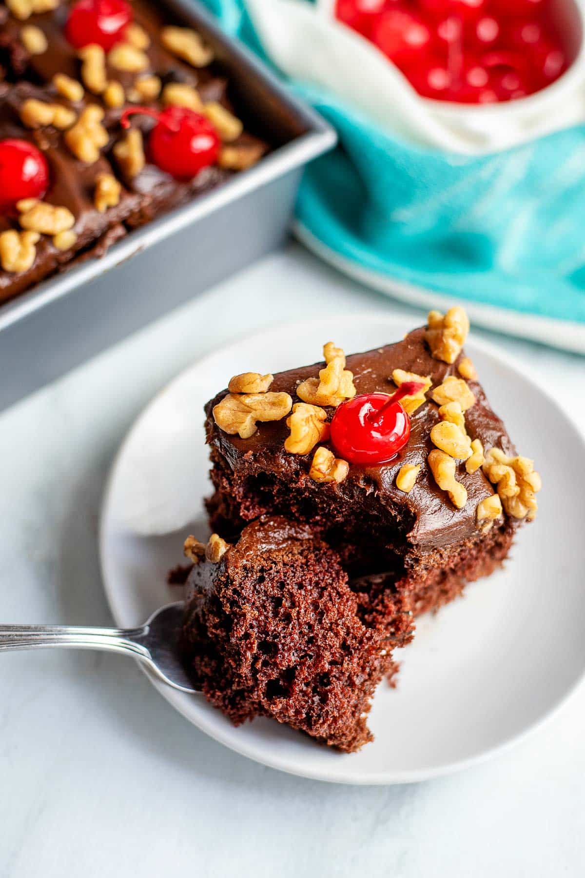 chocolate cherry cake piece with fork 