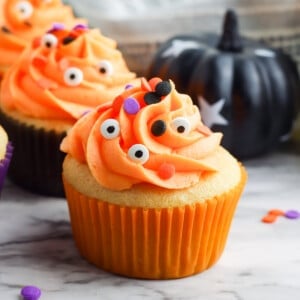frosted Halloween cupcakes with sprinkles