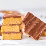 peanut butter bars stacked with bite sq