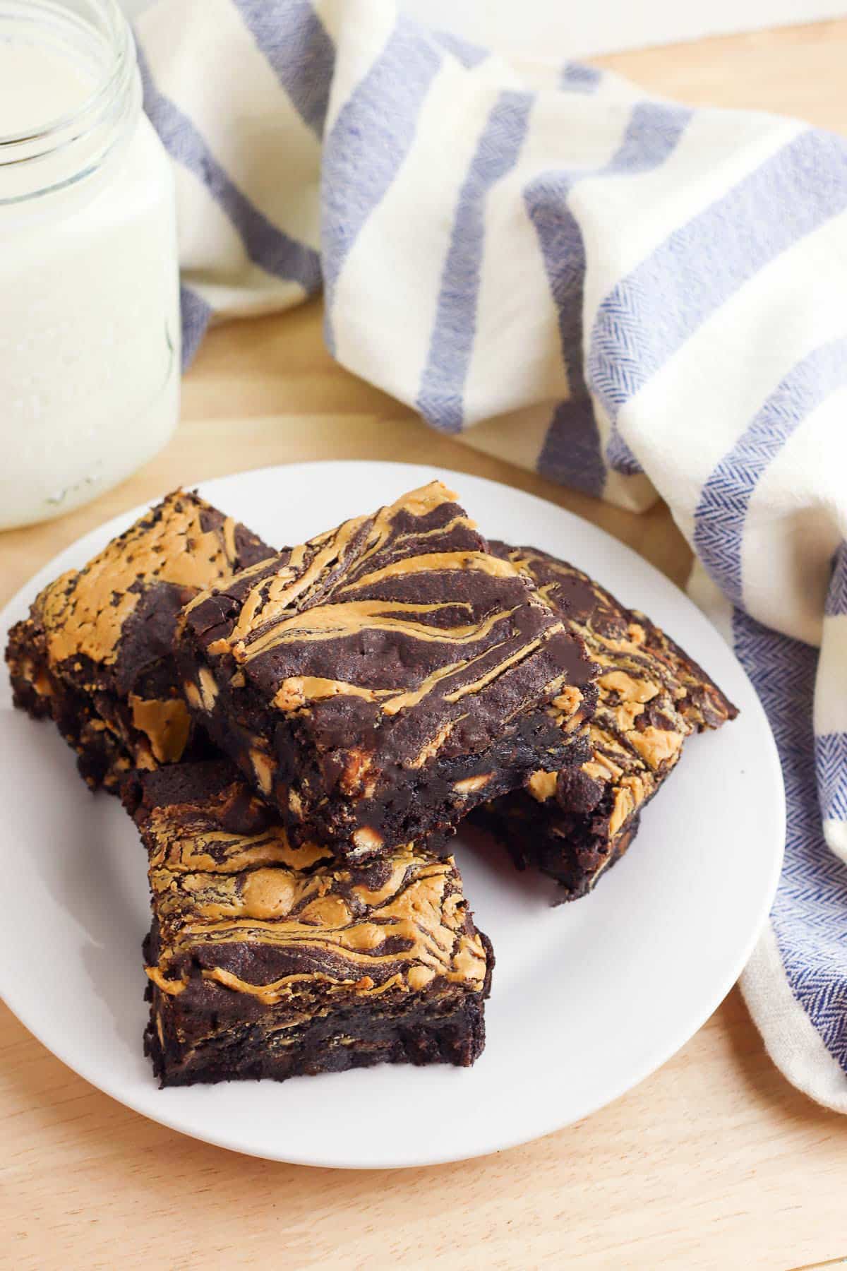 peanut butter brownies stacked on plate