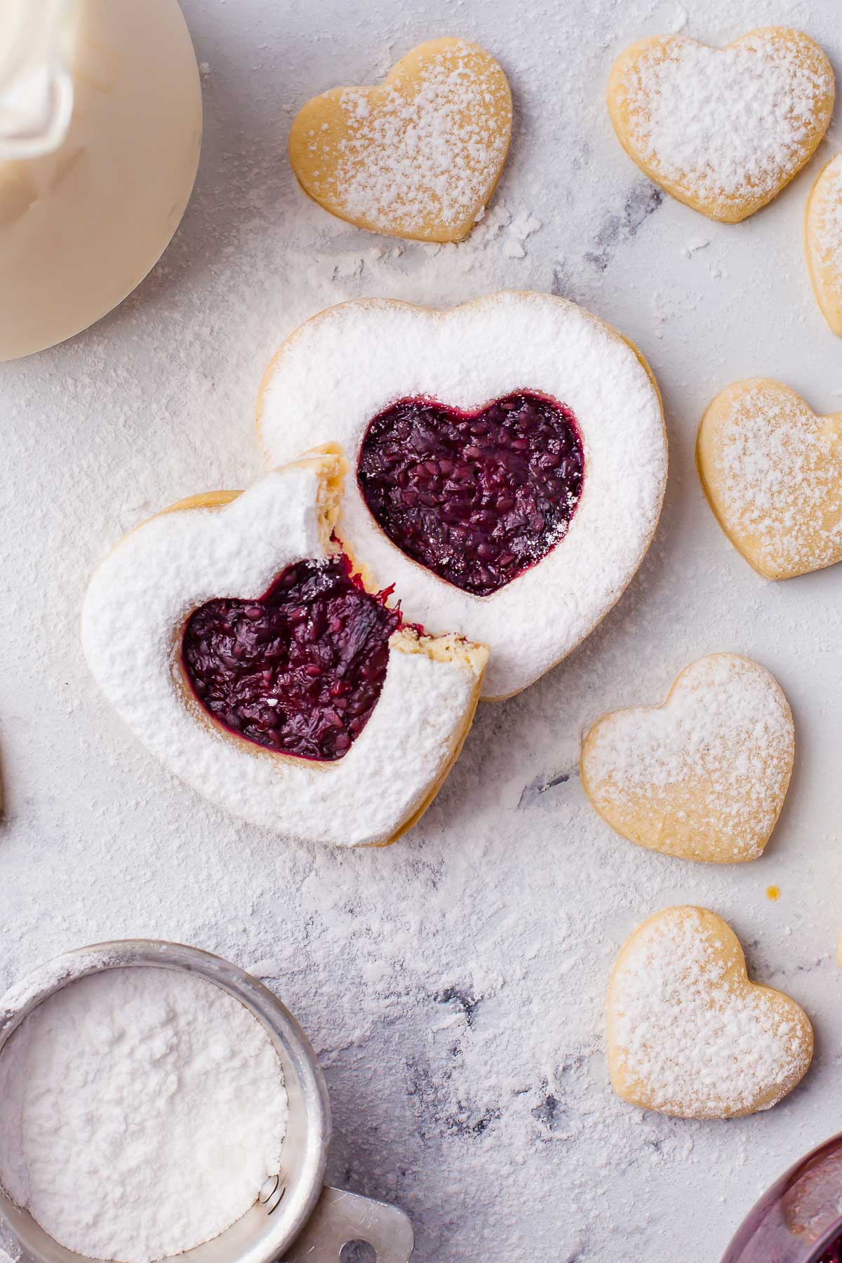 heart linzer cookies two with bite