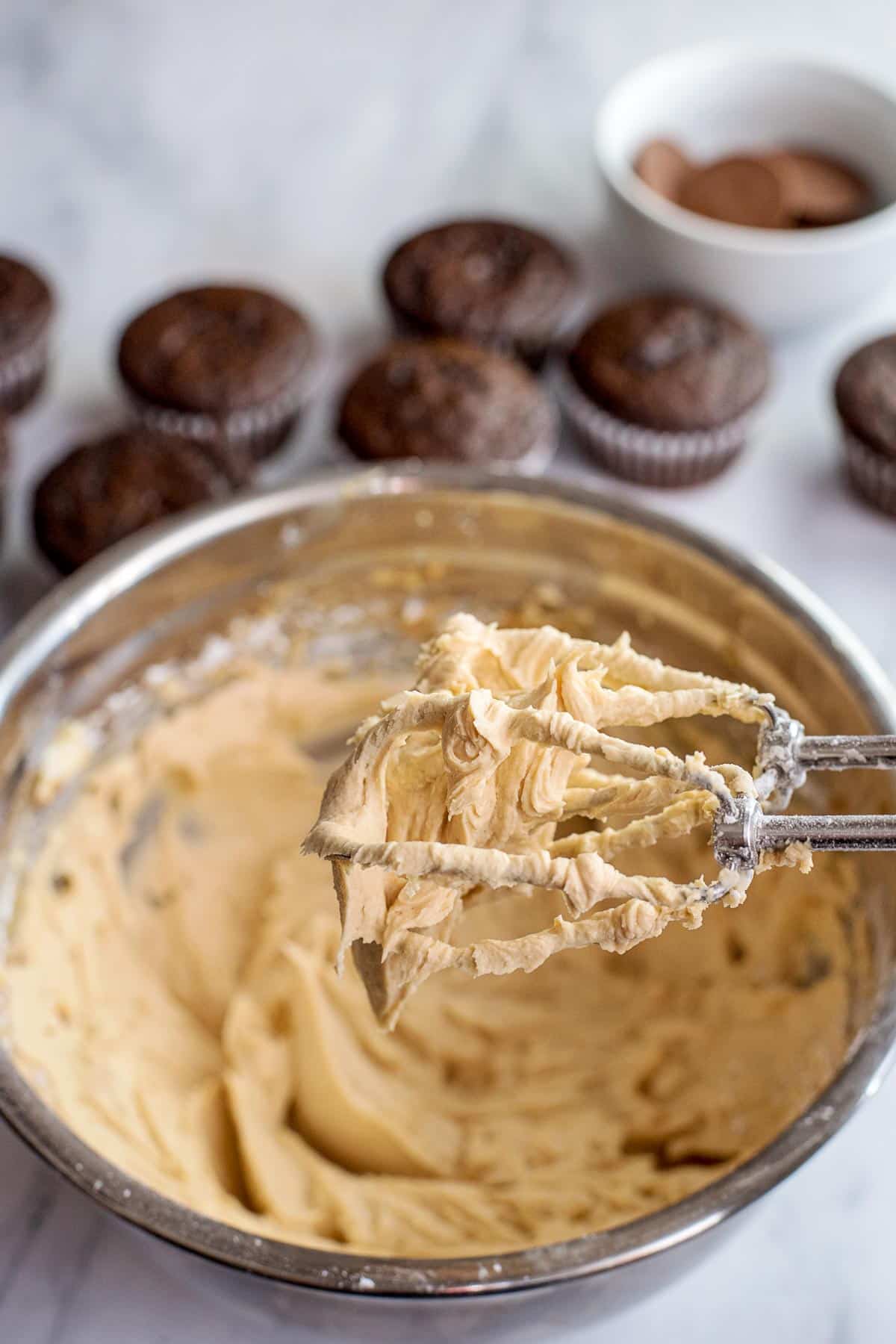 peanut butter frosting on mixer beaters