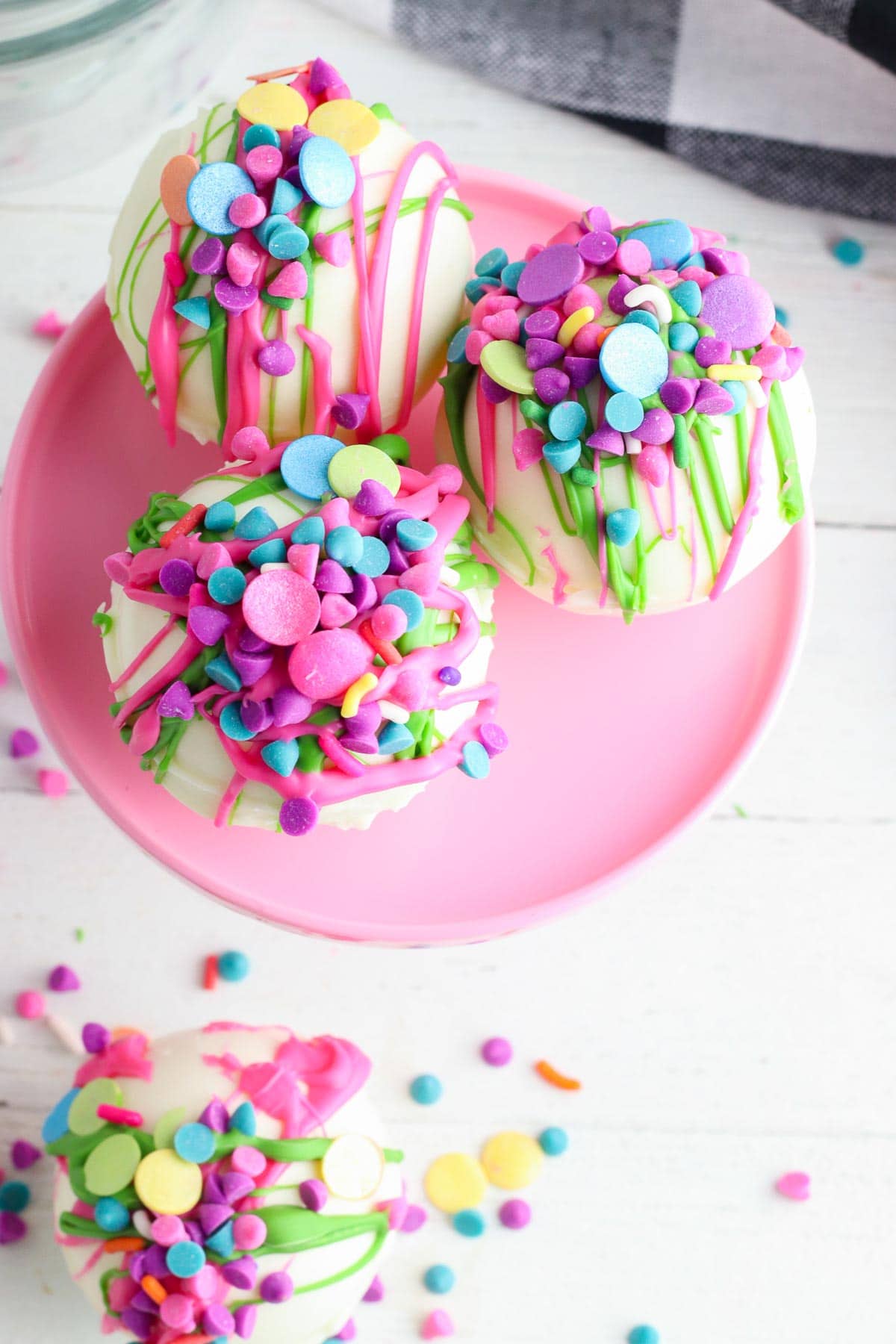 rainbow white chocolate hot cocoa bombs close up 