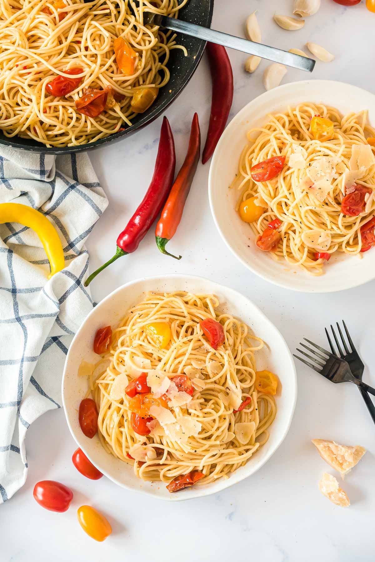 two bowls of spaghetti aglio e olio