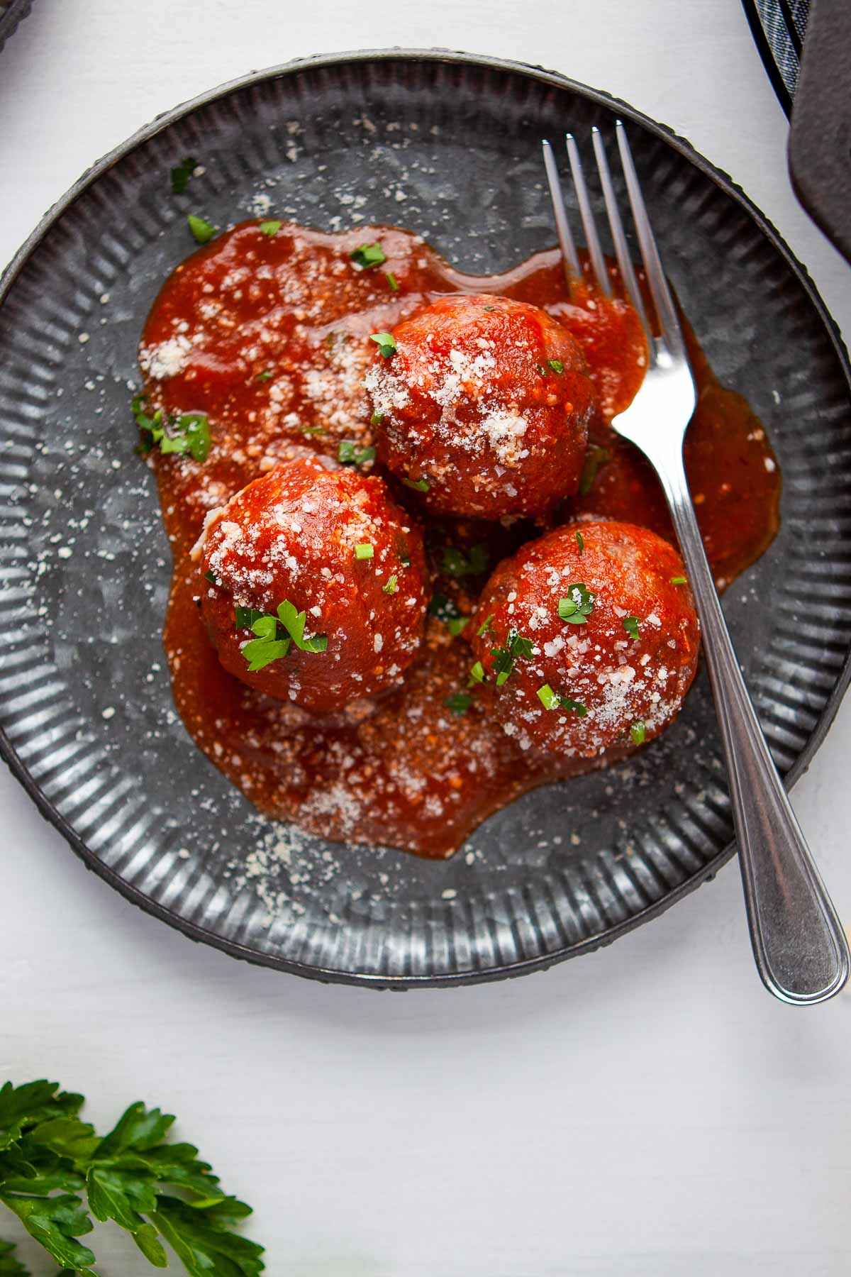 homemade meatballs with chipotle sauce on plate close up