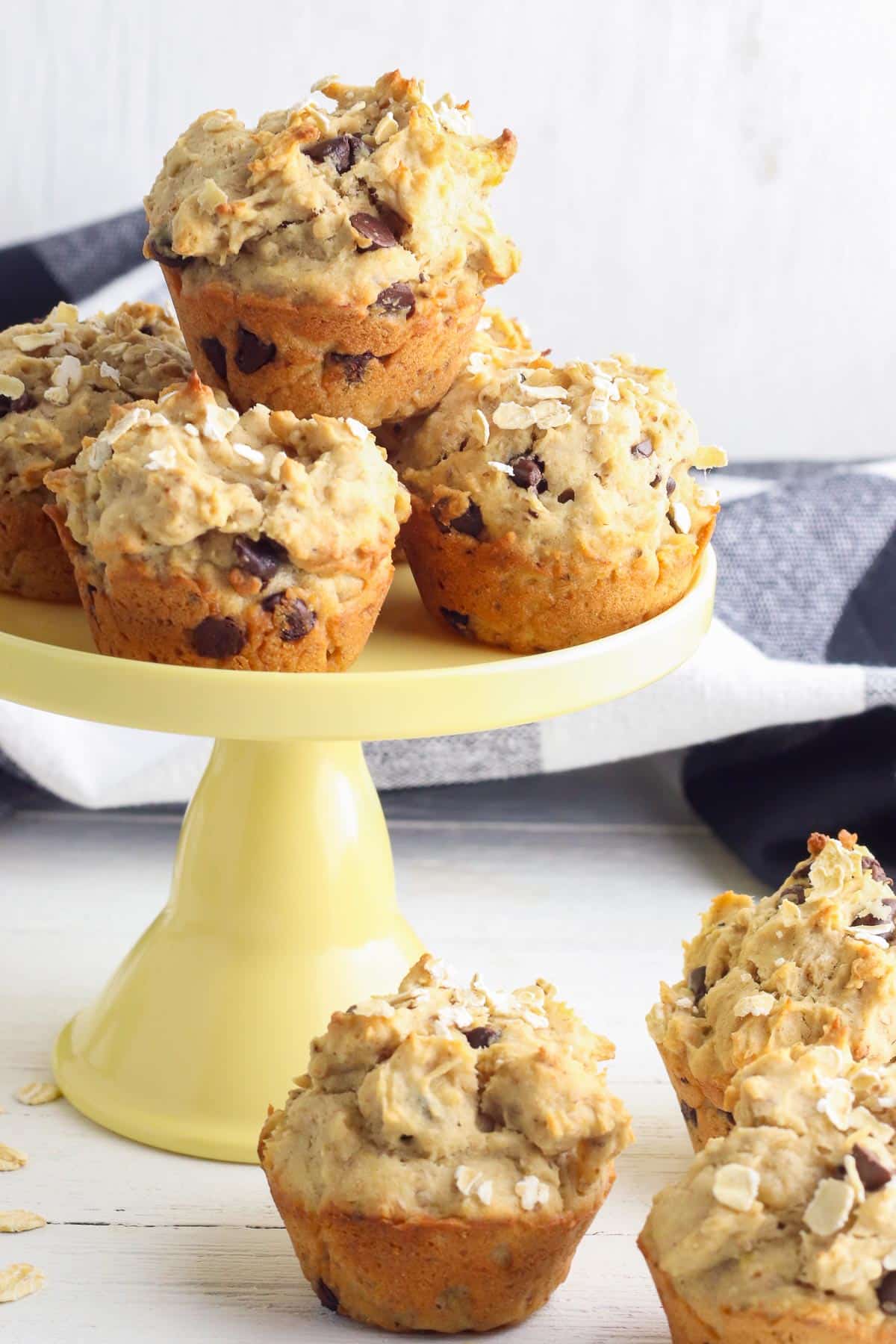 peanut butter banana muffins on pedestal