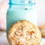 coconut cookies with blue jar of milk