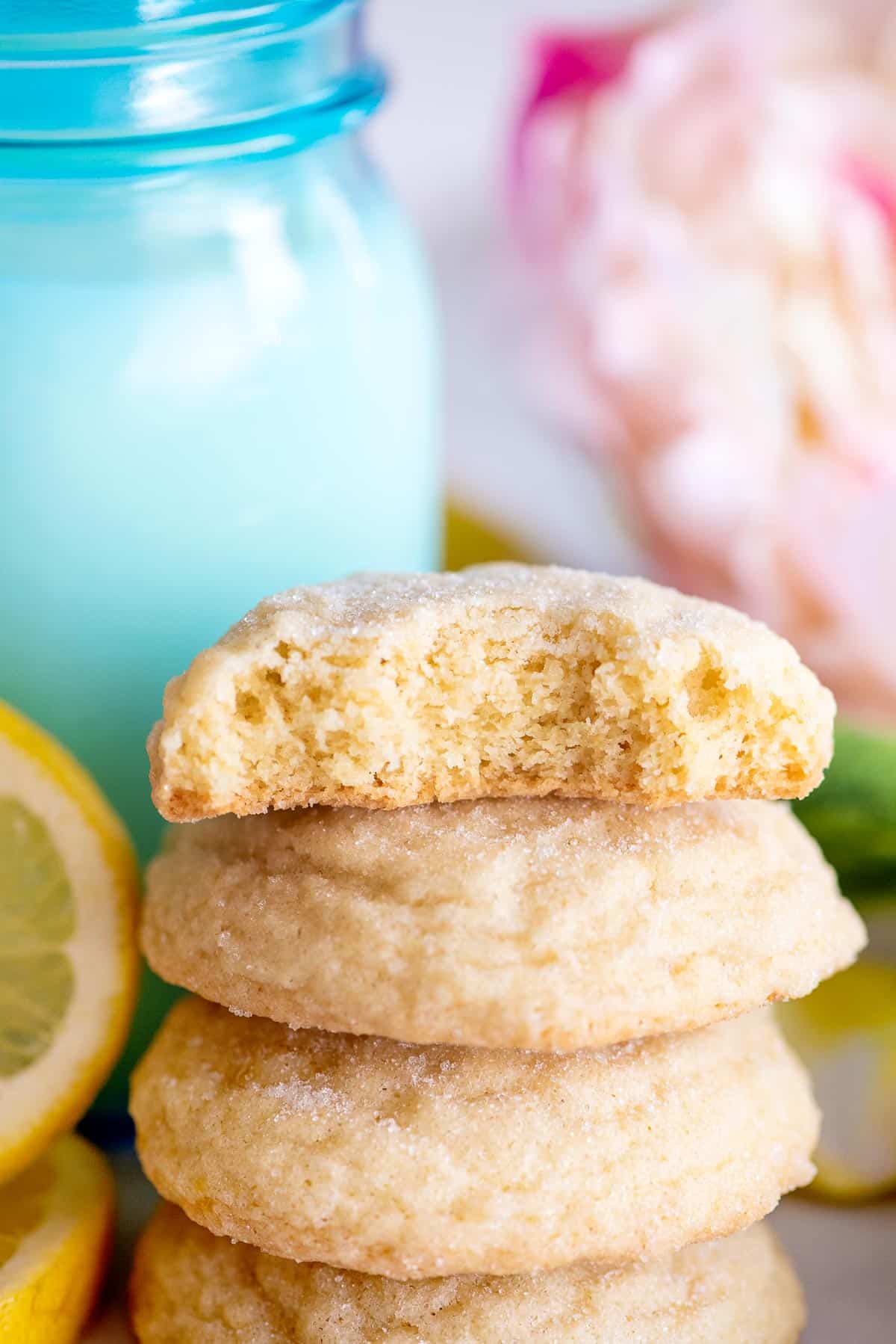 stack of lemon sugar cookie with bite