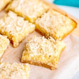 coconut bars on cutting board close up