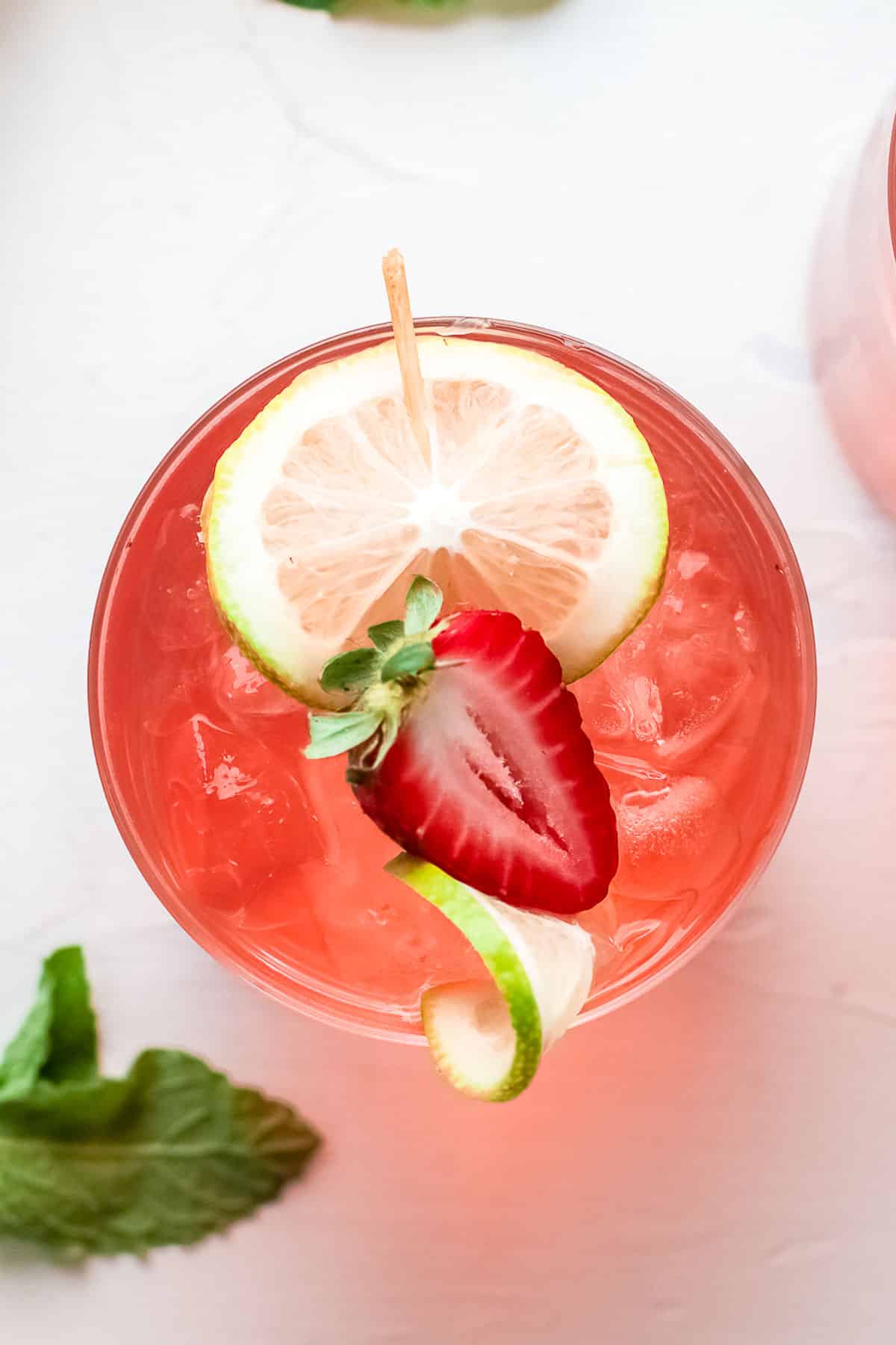 gin rickey with strawberry overhead