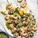 chimichurri grilled shrimp skewers from overhead.
