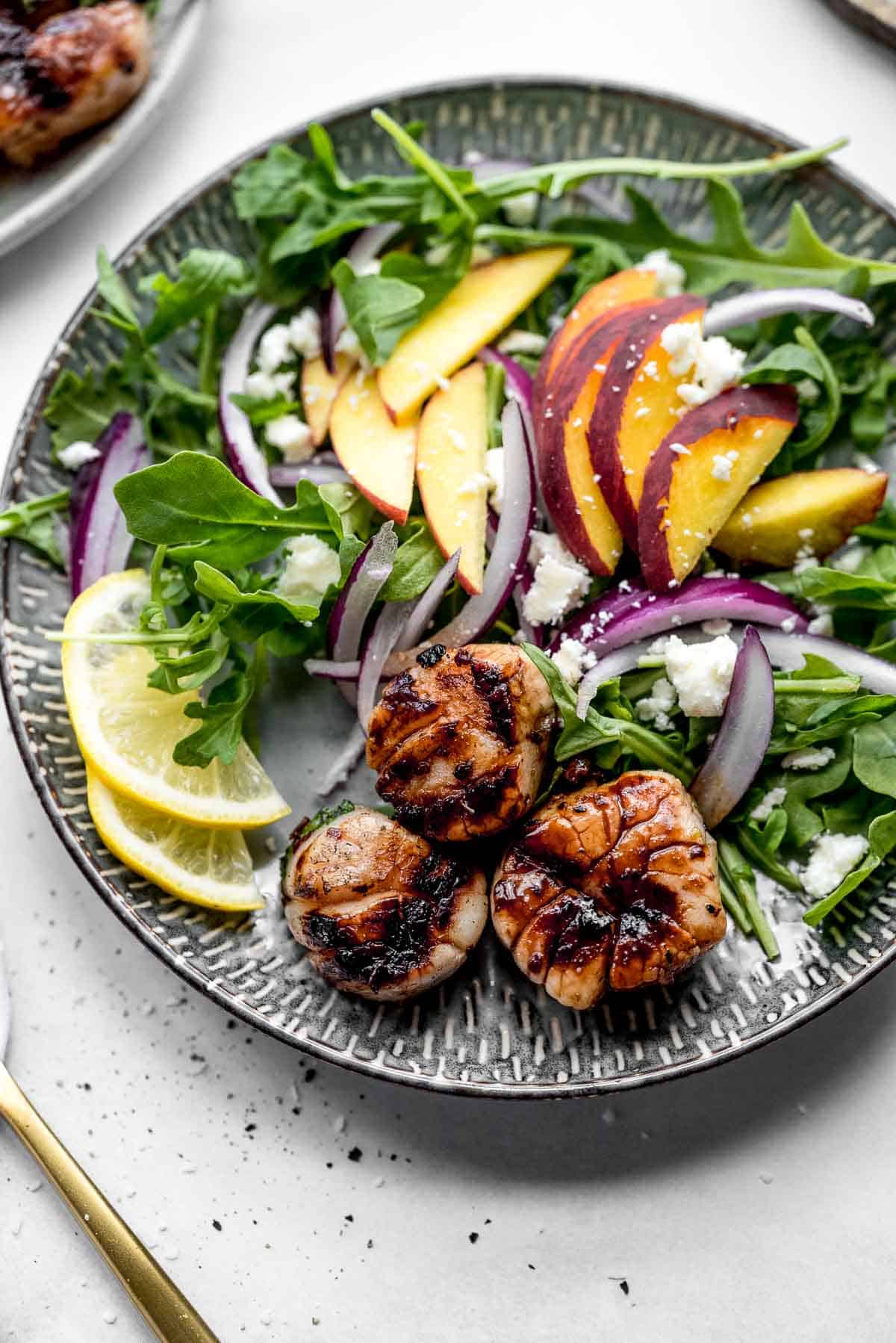 grilled scallops with peach salad.