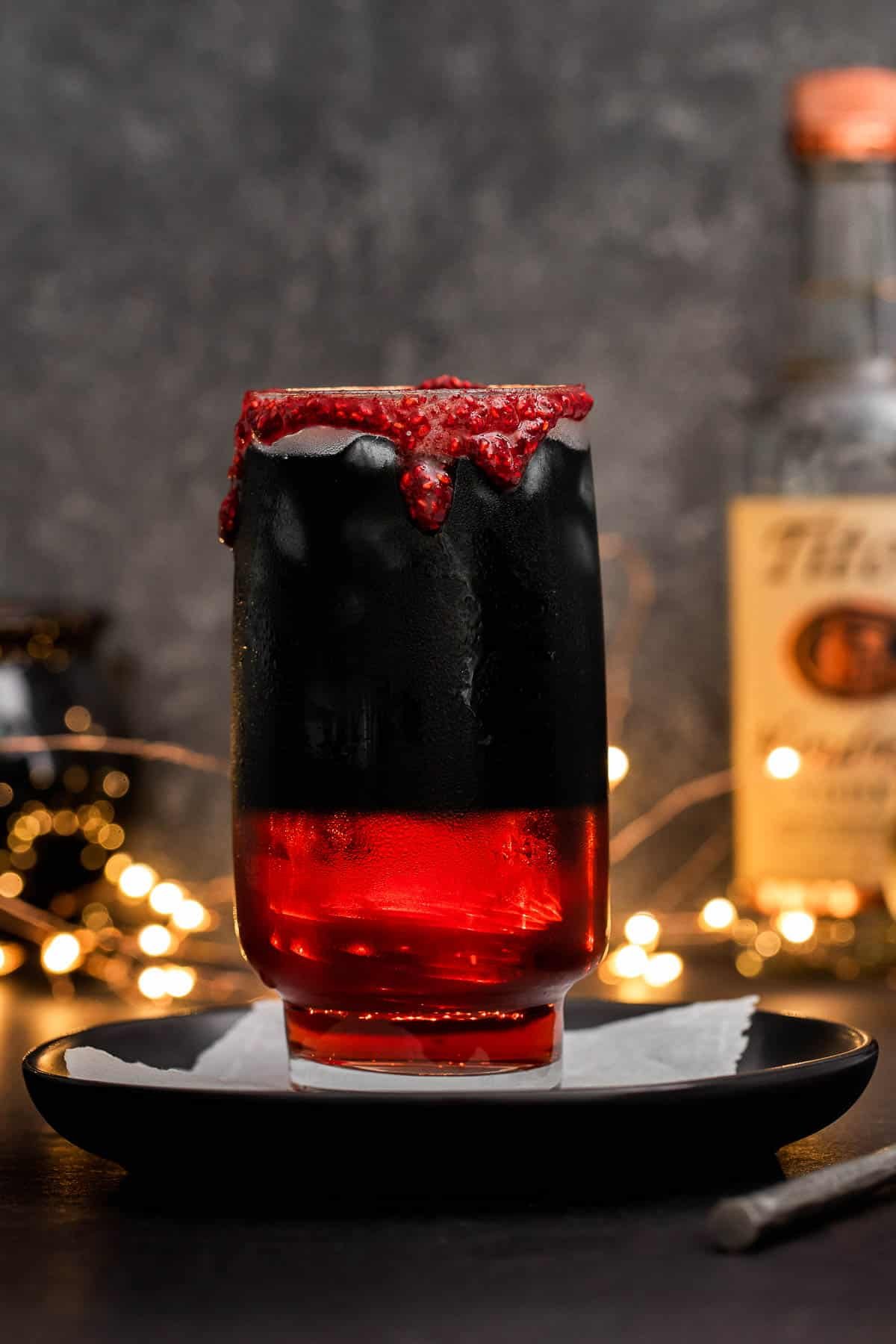 halloween vodka cranberry cocktail with fake blood rim.