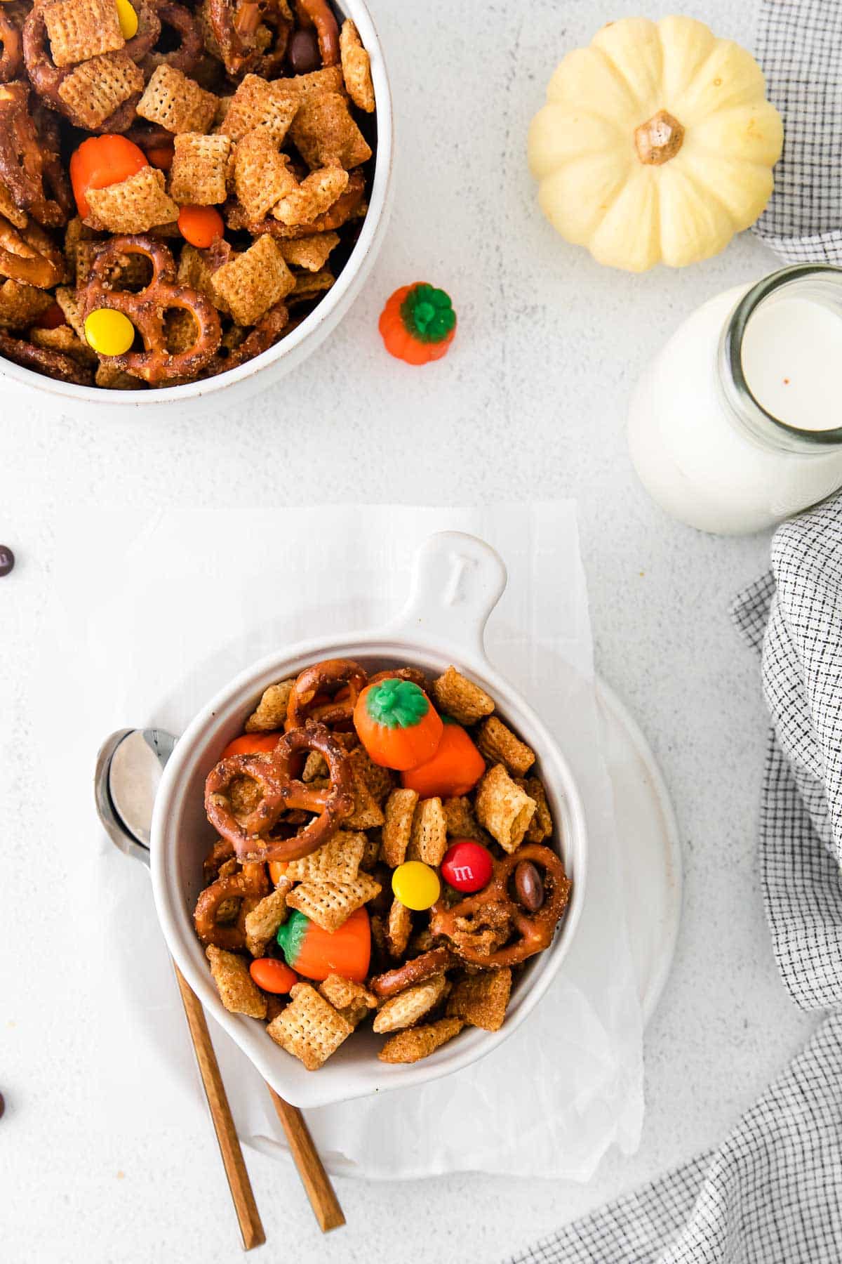 halloween chex mix in multiple white bowls from overhead.