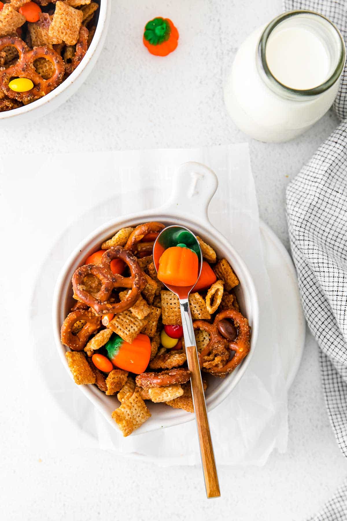 halloween chex mix in white bowl overhead.