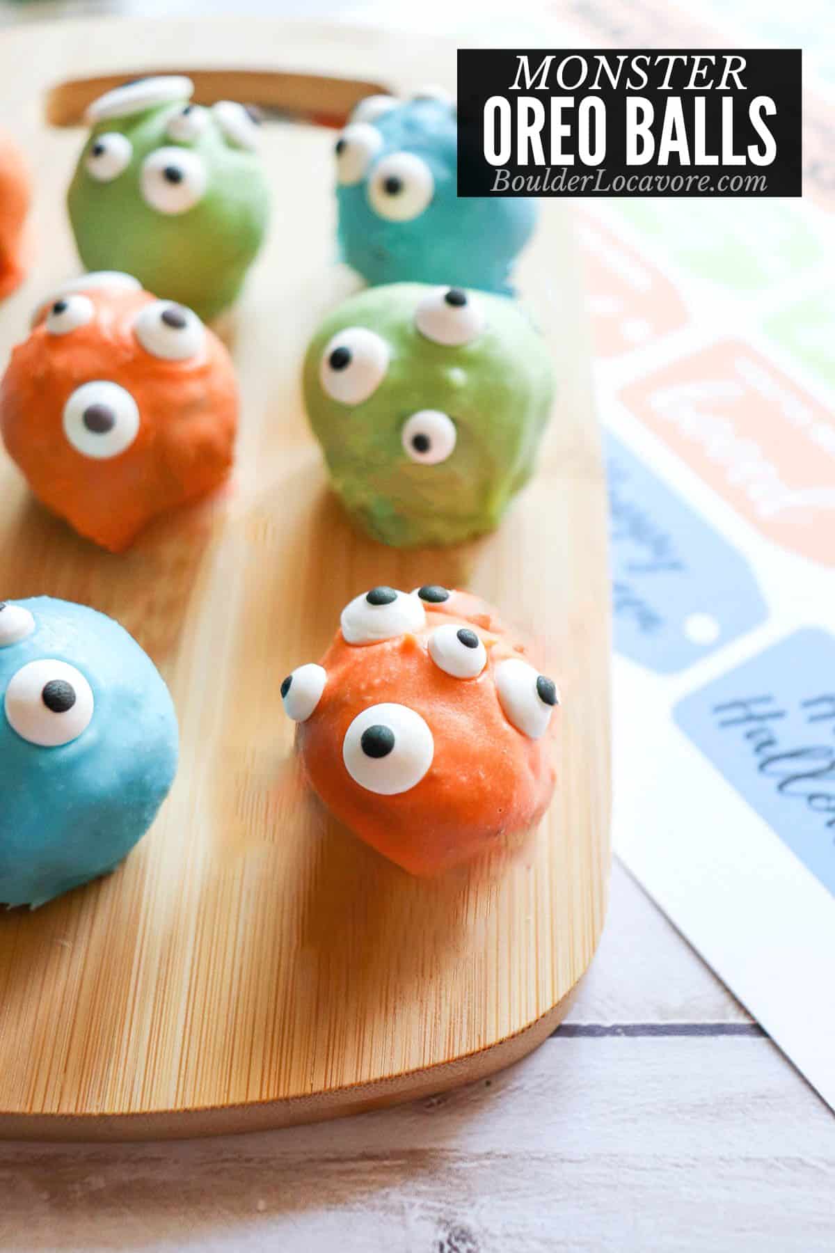 monster oreo balls with colorful coatings.