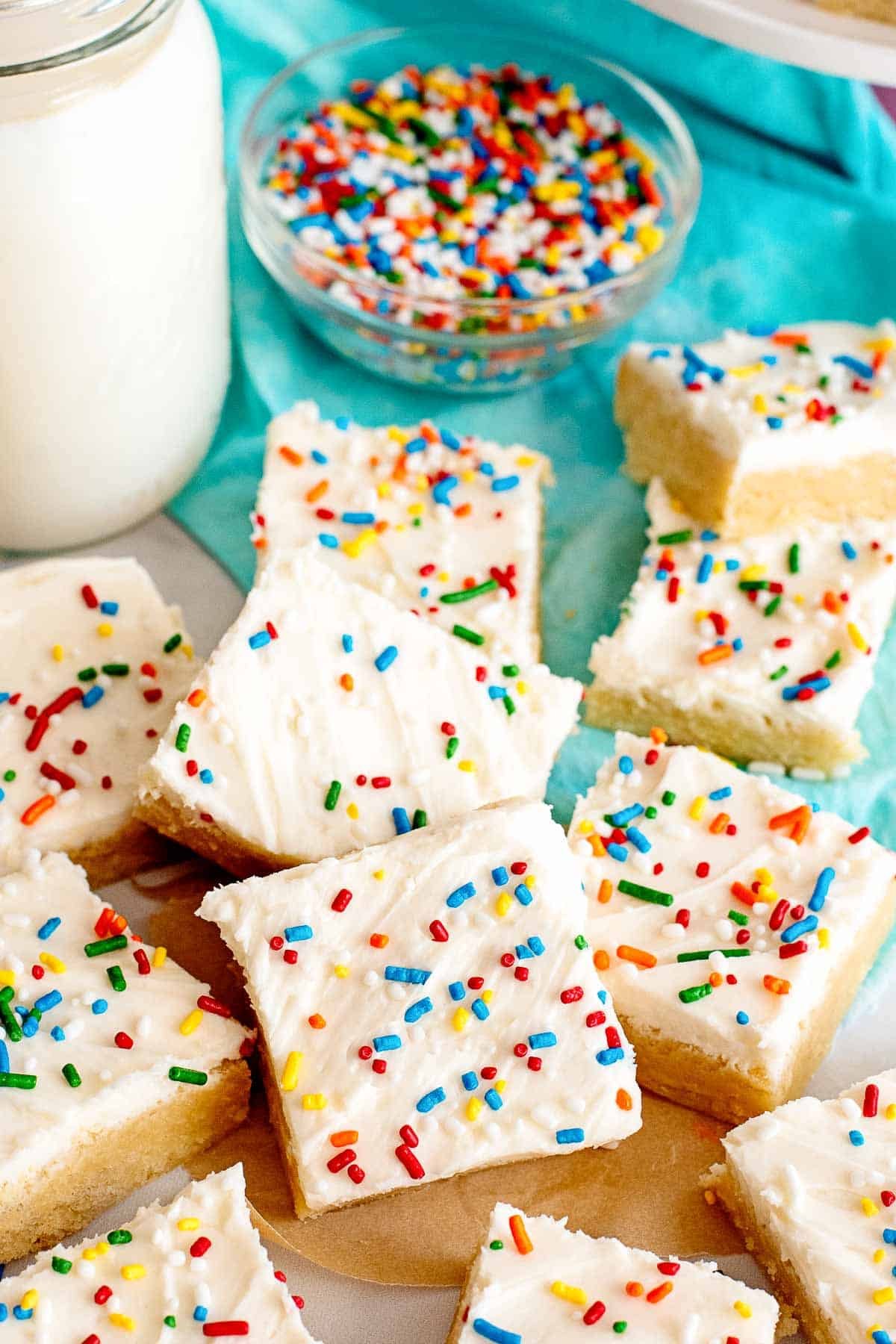 stacked sugar cookie bars pile with sp.