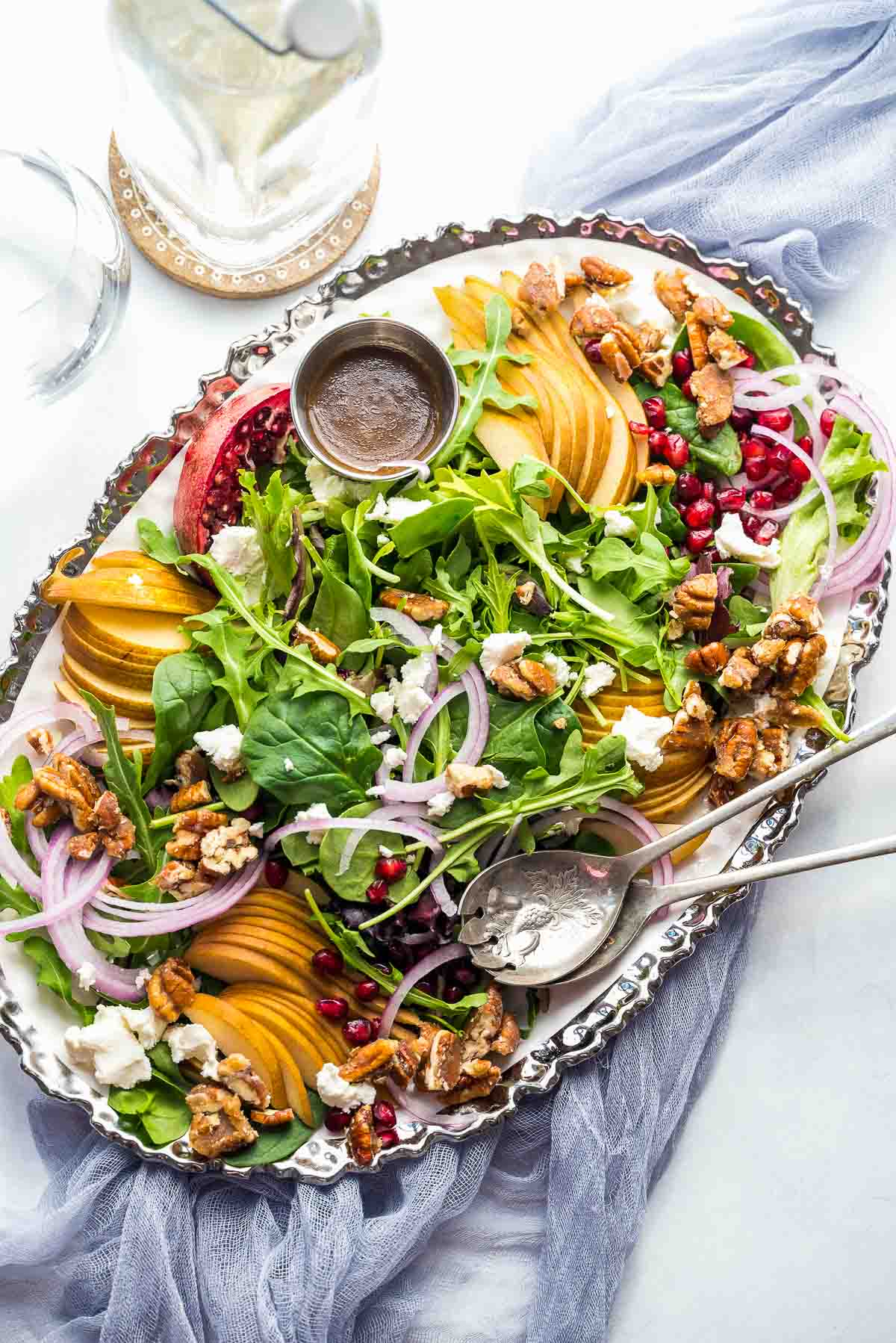 pear salad on platter with dressing.