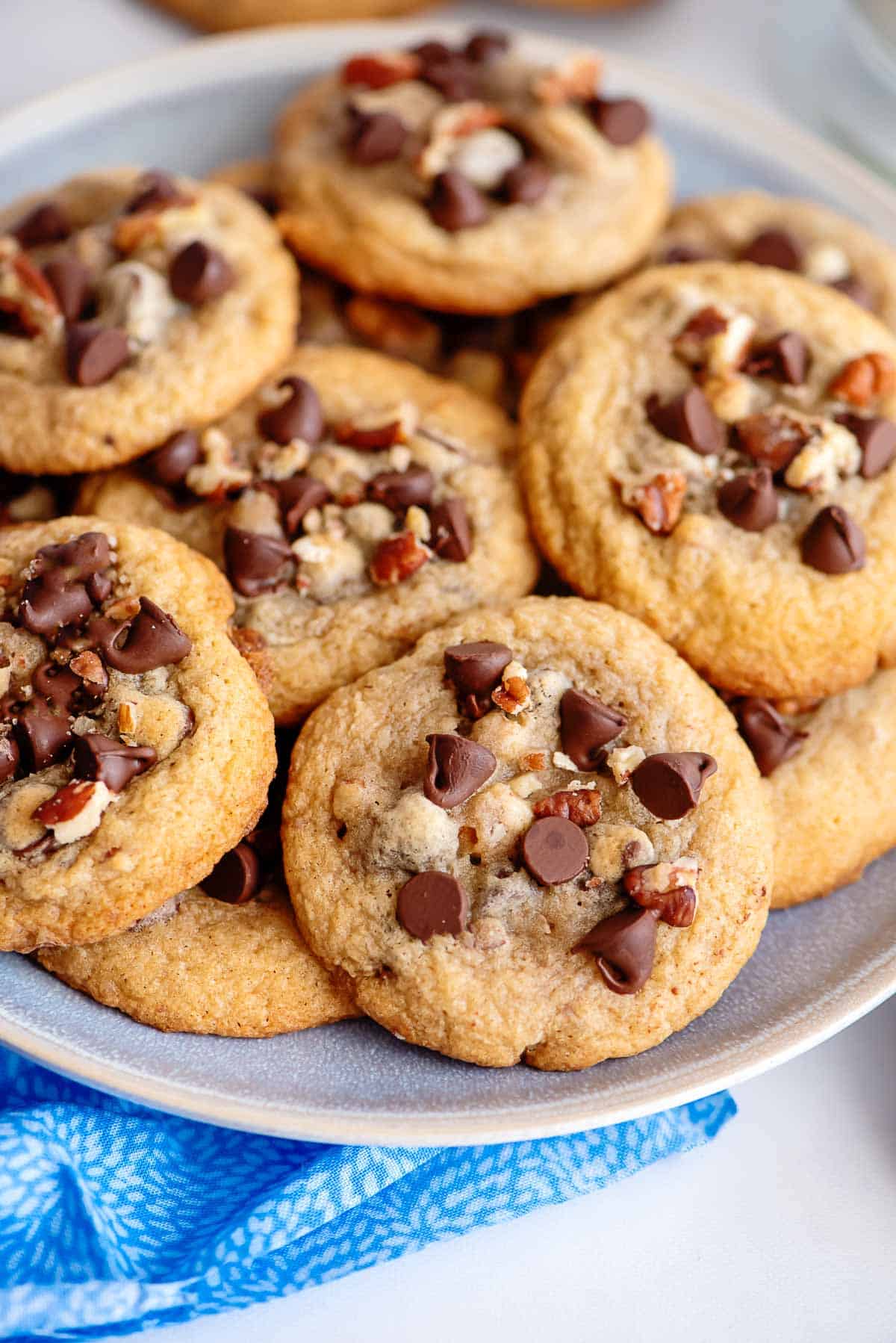 chocolate chip pecan cookies on a plate.