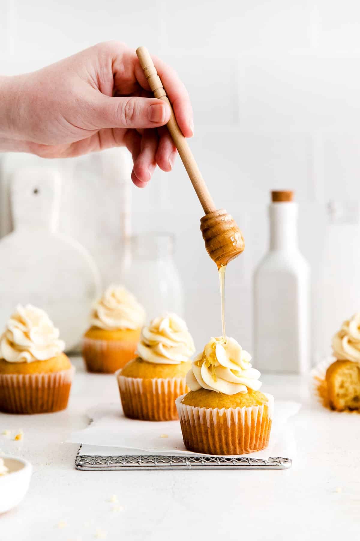 drizzling honey on honey cupcakes.