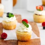 berry filled vanilla cupcakes with mascarpone frosting