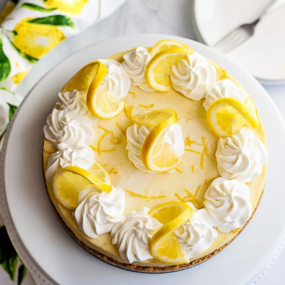 lemon cheesecake on white plate