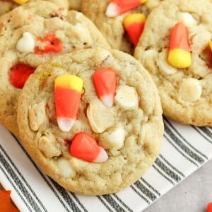 candy corn cookies on plate on striped plate crop.