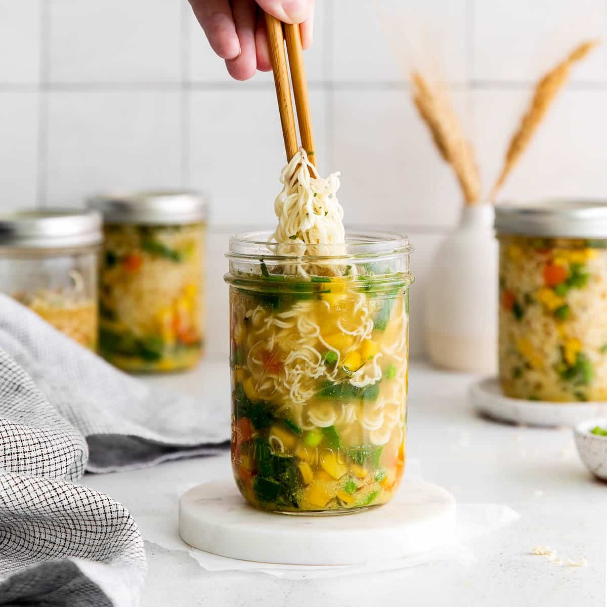 https://boulderlocavore.com/wp-content/uploads/2023/09/cup-noodles-recipe-ramen-broth-with-chopsticks-crop.jpg