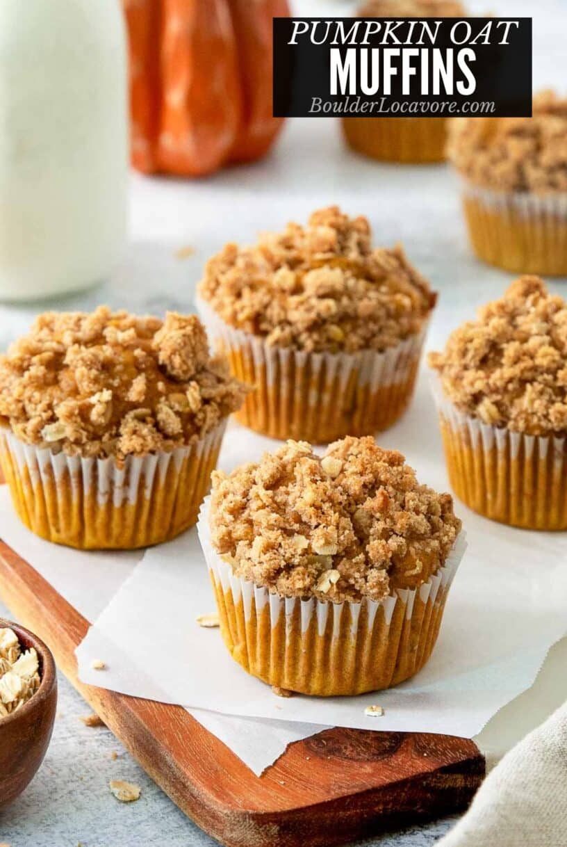 pumpkin oat muffins on cutting board.
