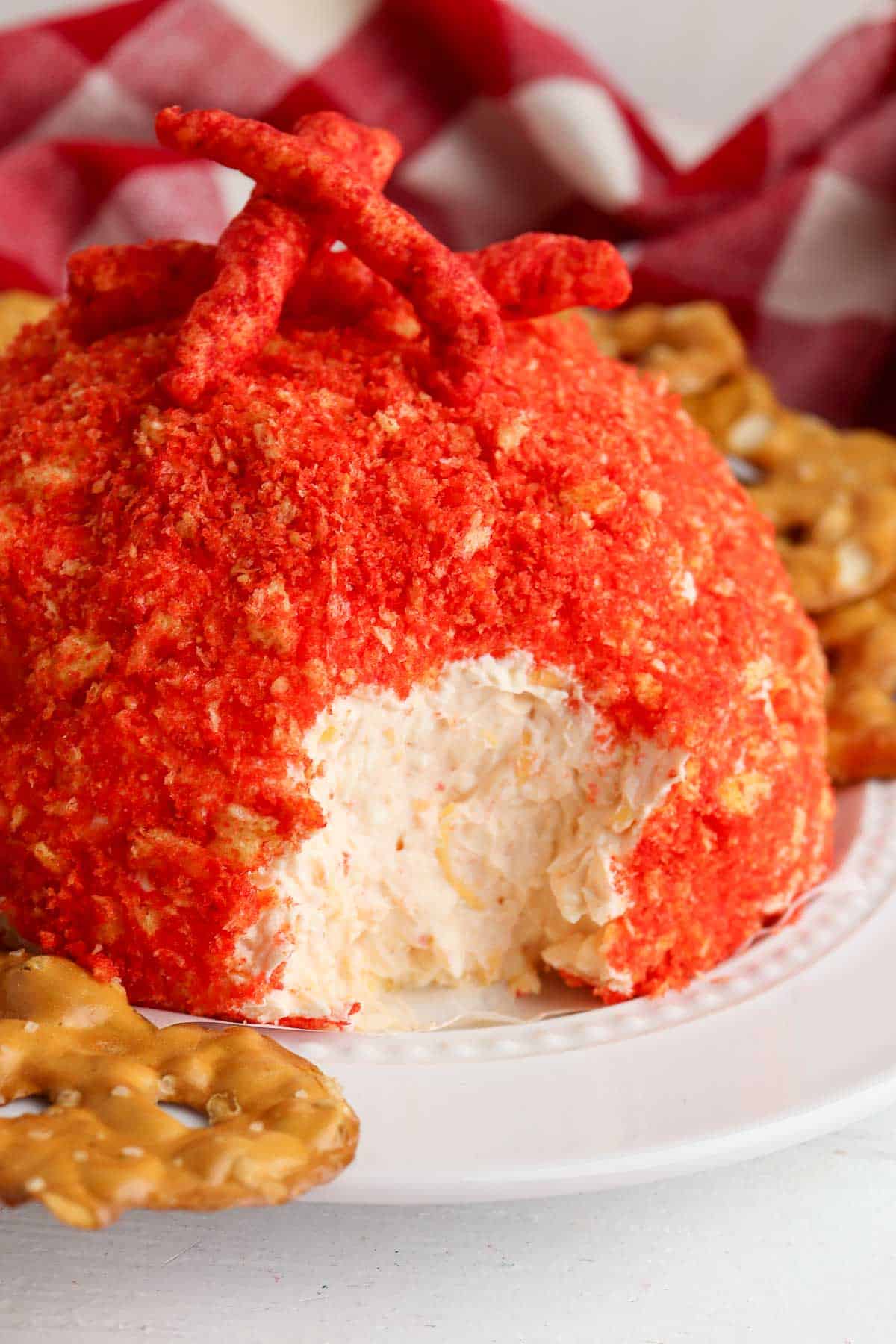 spicy cheese ball with inside showing.