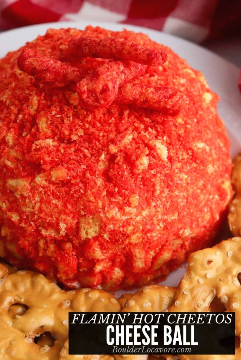 spicy cream cheese ball with pretzel crackers.
