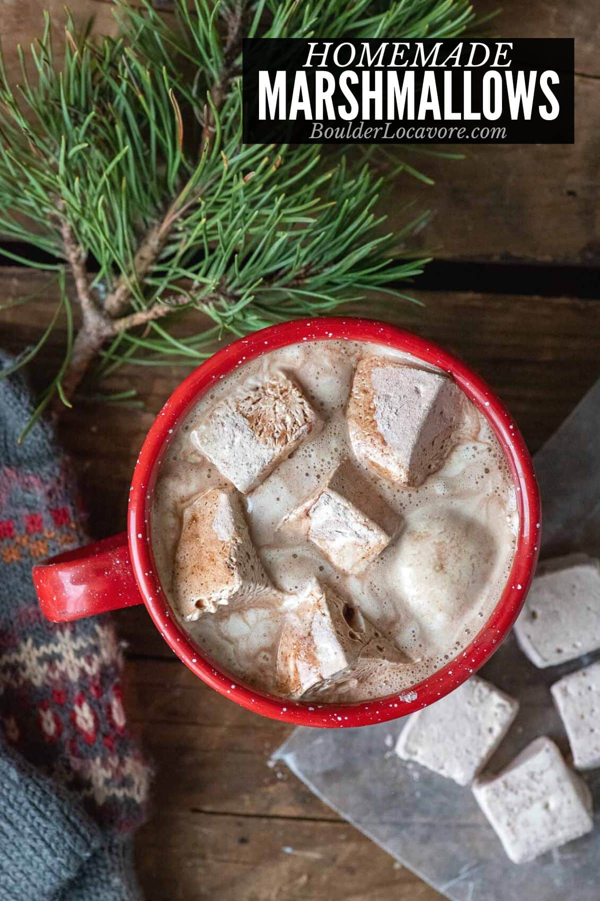 homemade marshmallows in a red enamel cup.