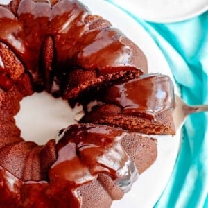 chocolate pound cake with glaze above.