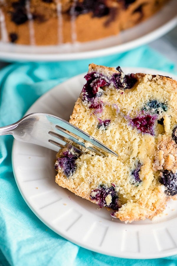 slice of coffee cake on plate with fork