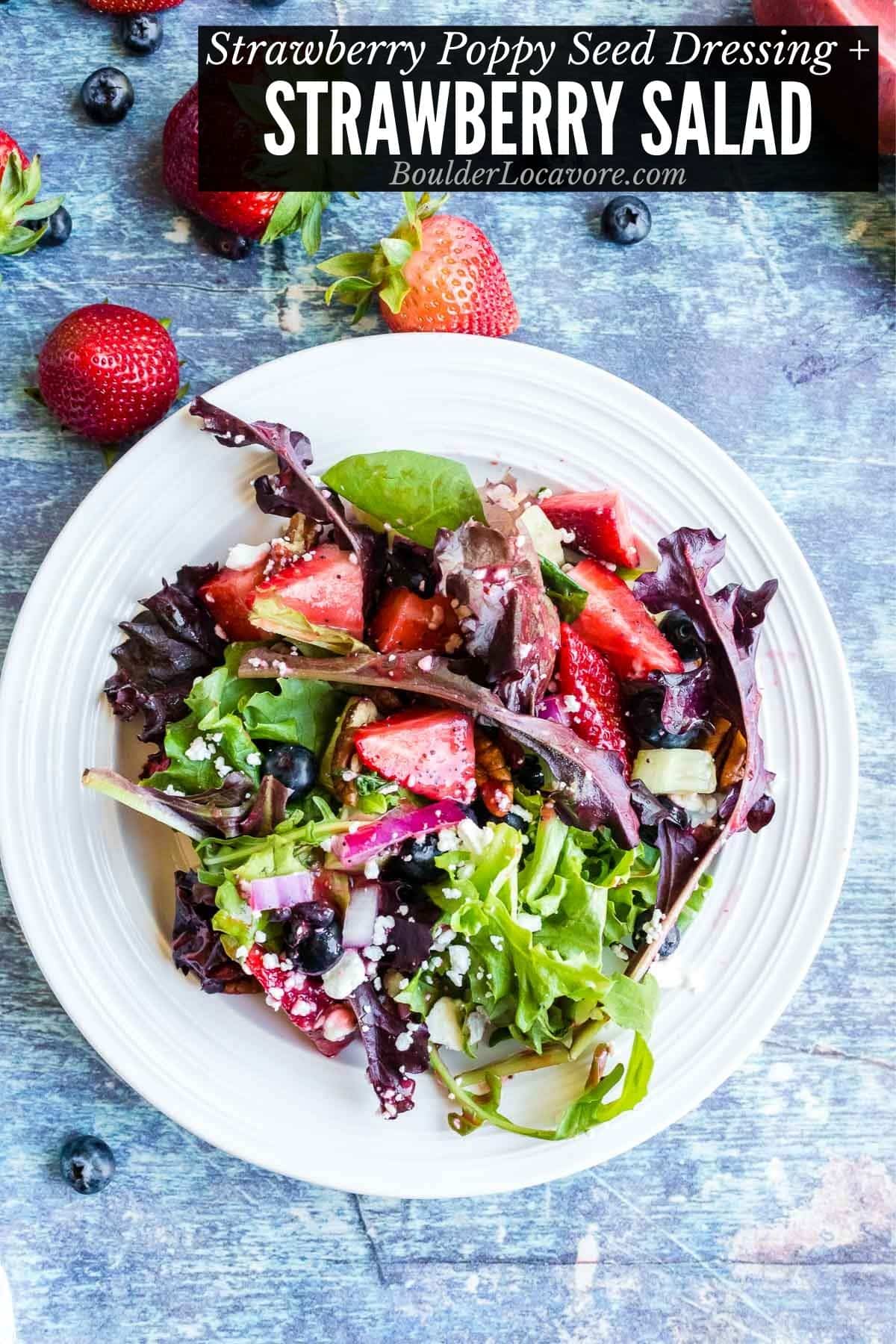 Strawberry Salad with Strawberry Poppy Seed Dressing on a white plate with recipe title