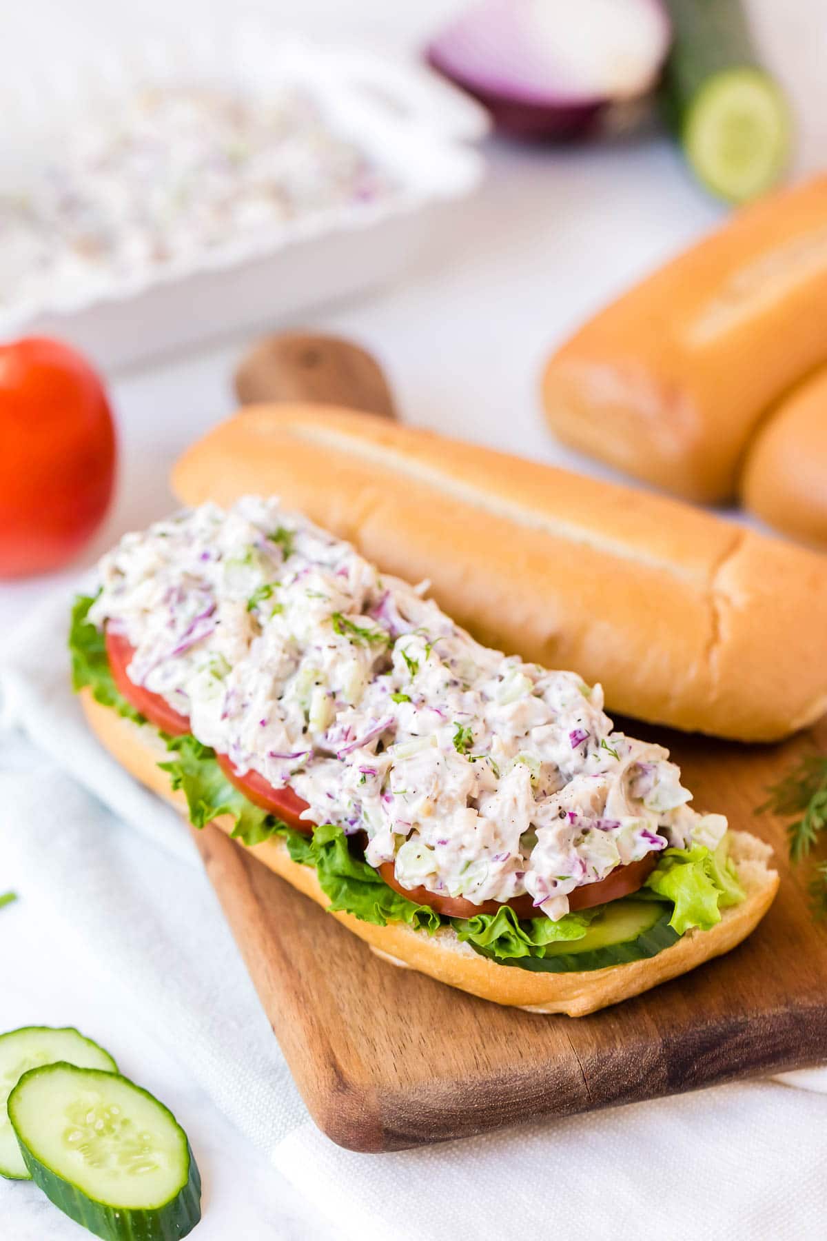 chicken salad on roll with vegies 